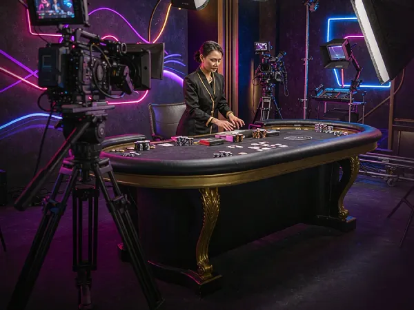 cloudbet camera and studio lighting facing a casino table